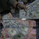 rupiah-tersenyum-tipis-ke-rp16.570-pagi-ini