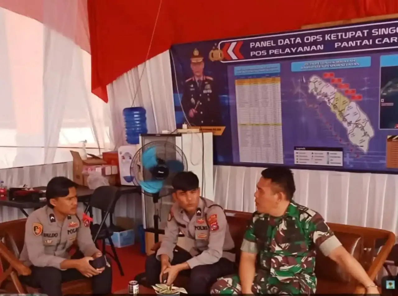 kolaborasi-anggota-koramil-03/iv-jurai-ciptakan-kamtibmas-di-lokasi-wisata-pantai-carocok
