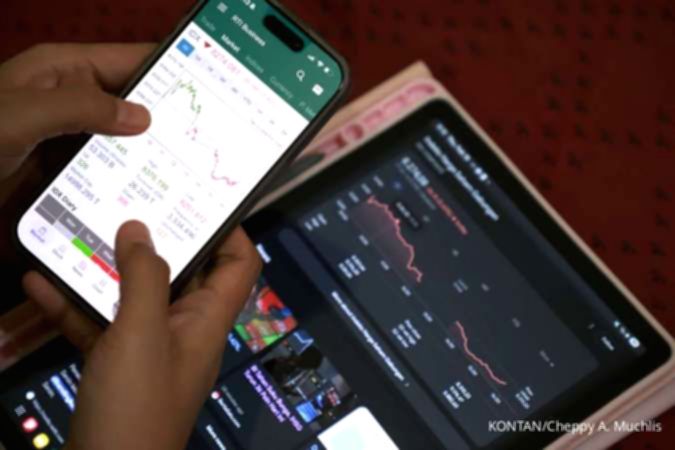 Layar monitor menampilkan grafik pergerakan Indeks Harga Saham Gabungan di Bursa Efek Indonesia.