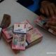 Grafik pergerakan nilai tukar rupiah terhadap dolar AS di layar monitor