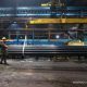 Gedung kantor dan logo PT Steel Pipe Industry of Indonesia Tbk (ISSP)