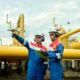 Papan layar digital menampilkan pergerakan grafik saham PT Perusahaan Gas Negara Tbk atau PGAS di bursa efek.