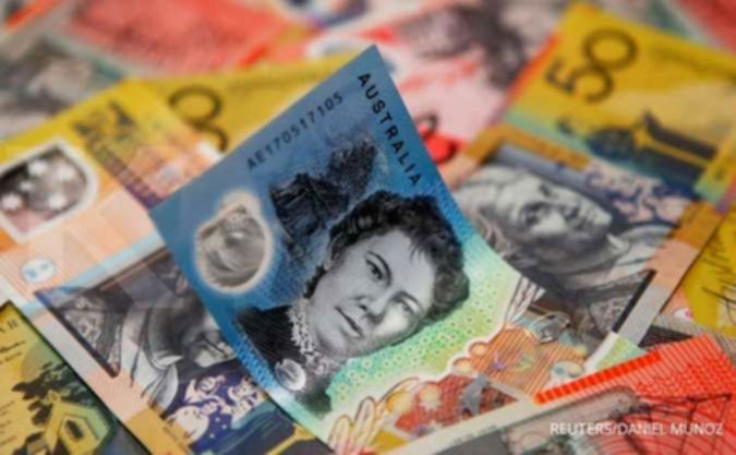Grafik pergerakan nilai tukar mata uang AUD, CAD, dan NZD terhadap USD di pasar valuta asing