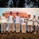 Perwakilan bank bjb menerima dua penghargaan dari OJK dalam acara Puncak Hari Indonesia Menabung Nasional 2026.