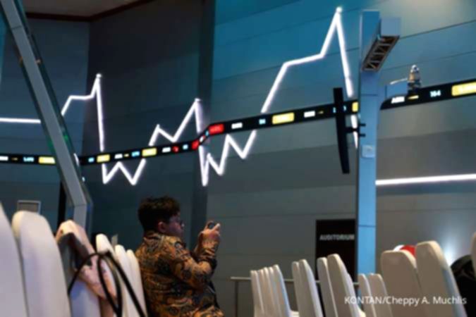 Grafik pergerakan Indeks Harga Saham Gabungan di layar monitor bursa efek