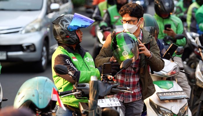 Aturan Status Ojol di Indonesia dan Negara Tetangga: Perbandingan Regulasi Terbaru