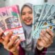 Grafik pergerakan nilai tukar mata uang Rupiah terhadap Dolar AS di layar monitor pasar keuangan