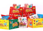 Logo PT Yupi Indo Jelly Gum Tbk pada latar belakang putih