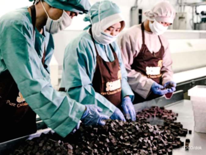 Papan nama PT Wahana Interfood Nusantara Tbk di kantor pusat perusahaan