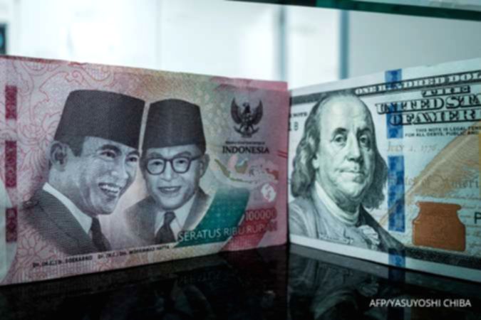 Tampilan layar grafik pergerakan nilai tukar mata uang Rupiah terhadap Dolar AS