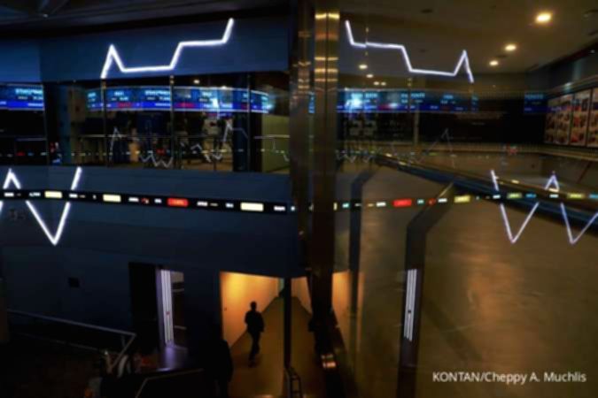 Grafik pergerakan Indeks Harga Saham Gabungan (IHSG) yang menunjukkan tren kenaikan di layar monitor bursa efek.