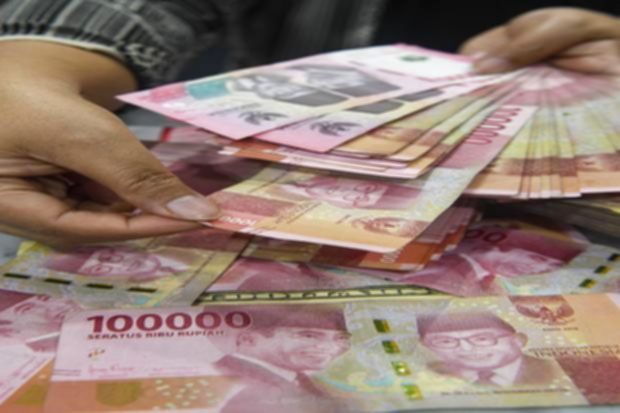 Uang kertas pecahan Rp100.000 dengan tanda tangan Purbaya Yudhi Sadewa dan Perry Warjiyo