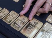 Tampilan antarmuka aplikasi Tring! untuk layanan investasi emas batangan dari Pegadaian.
