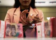 Grafik pergerakan nilai tukar rupiah terhadap dolar Amerika Serikat yang fluktuatif di pasar keuangan