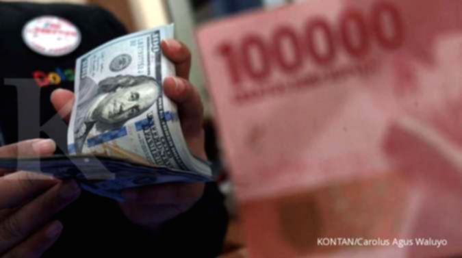 Grafik pergerakan mata uang Rupiah terhadap Dolar AS di layar monitor perdagangan
