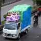 Truk logistik yang tertib aturan ODOL saat akan masuk ke dalam kapal feri di pelabuhan